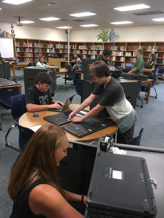 Ms. Russell's class preparing Chromebook carts.